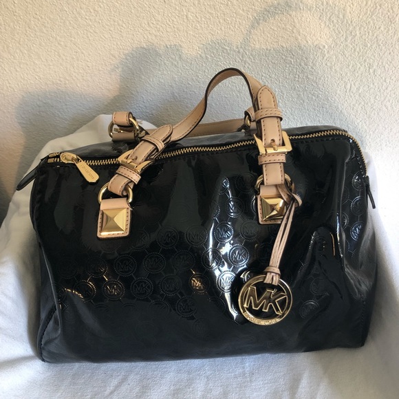 Michael Kors Handbags - authentic Michael Kors Grayson/ “speedy” handbag